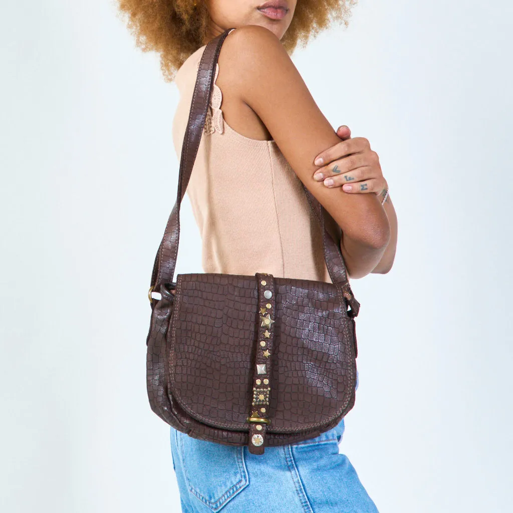 Embossed leather crossbody bag with studded accents wholesale