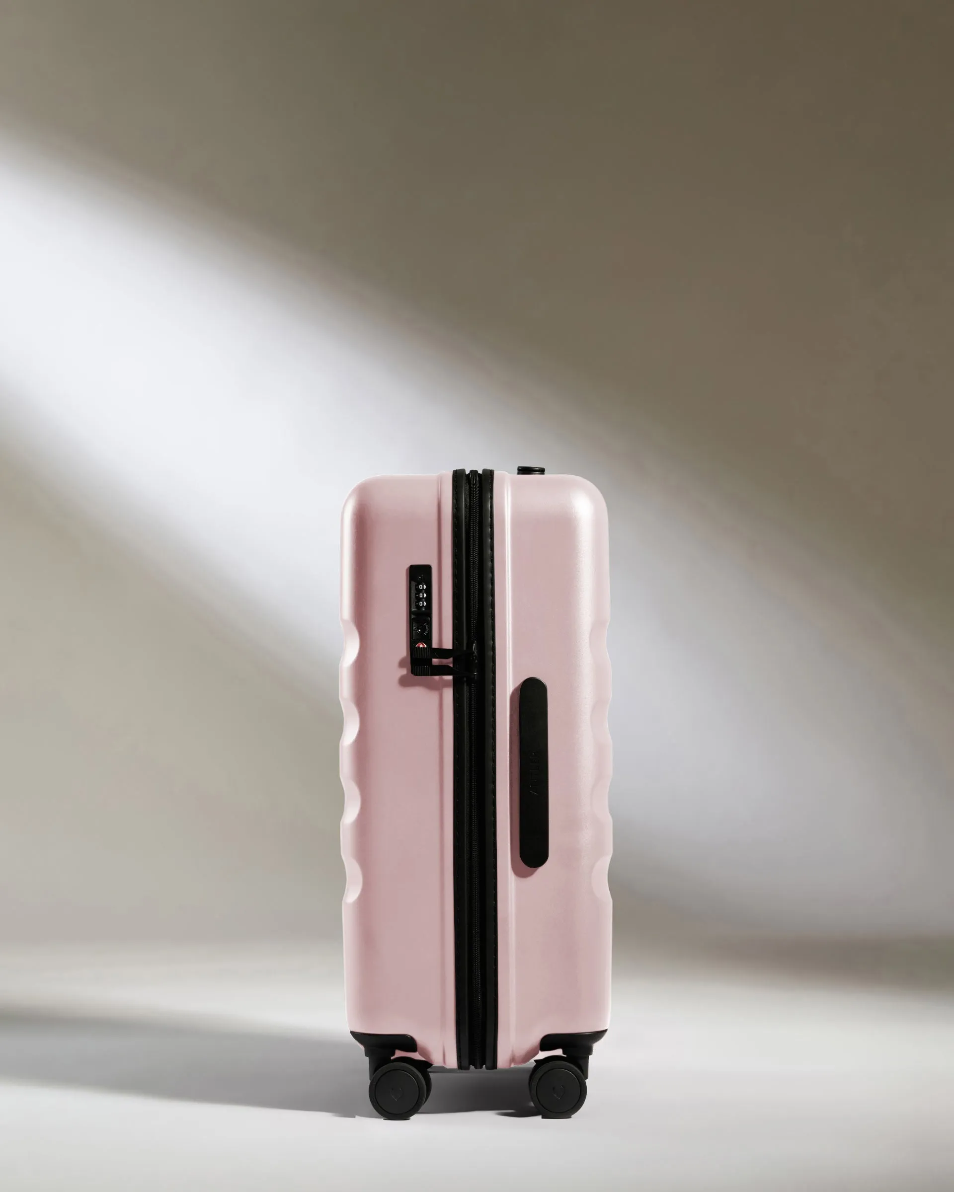 Large Cabin Suitcase in Moorland Pink - Icon Stripe